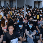 HONG KONG PROTESTERS STAGE SIT-IN AT SCHOOL OF VICTIM SHOT BY POLICE